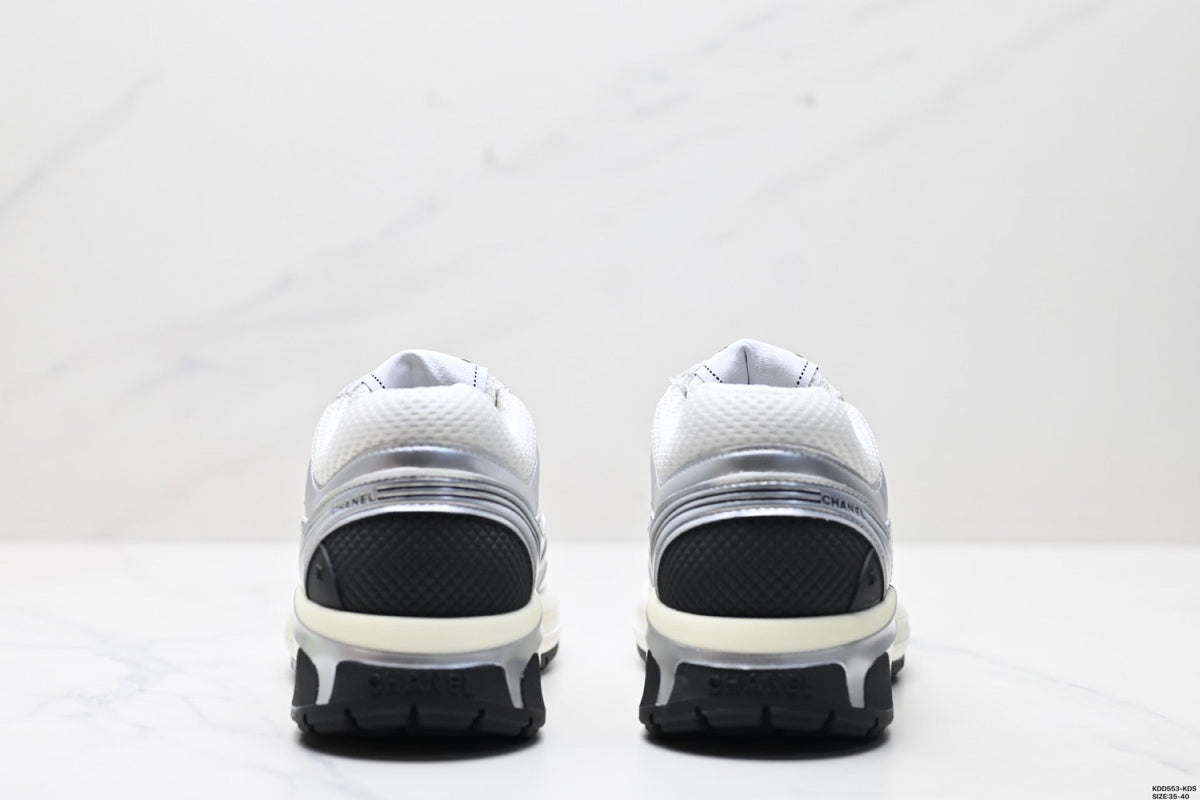 Chanel Leather Logo Low-Top Sneakers